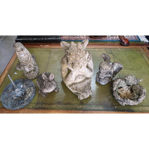 536 - A group of weathered concrete garden ornaments to include a bird bath with square detachable bowl, t... 