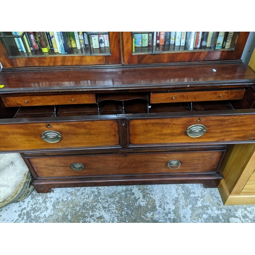 539 - A Victorian mahogany secretaire bookcase, shaped cornice above twin astragal glazed doors, the base ... 