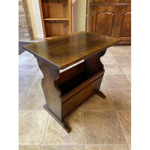 543 - A reproduction oak coffee table, together with a matching magazine rack and nest of three tables Loc... 