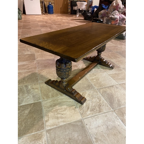 543 - A reproduction oak coffee table, together with a matching magazine rack and nest of three tables Loc... 