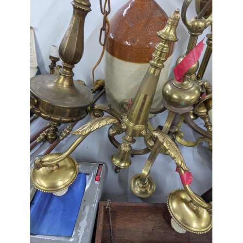 552 - A mixed lot to include a three branch brass chandelier together with a pair of wall hanging brass li... 