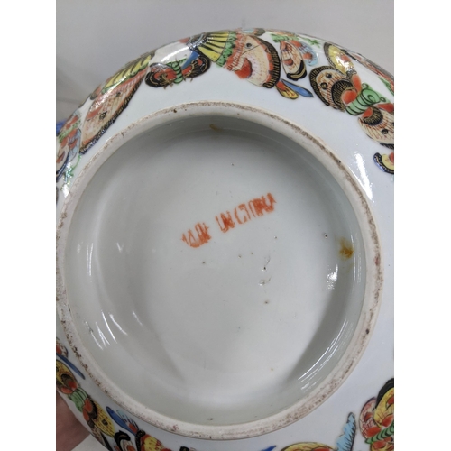 556 - A mixed lot to include an early to mid 20th century Chinese bowl decorated with butterflies A/F alon... 