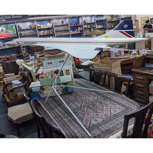 459 - A large travel agents advertising fiberglass model of a British Airways Concorde, 170cm long, on a s... 