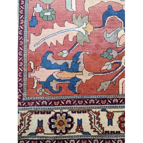 505 - A Persian rug with geometric motifs in pastel colours 245cm x 194cm Location: G