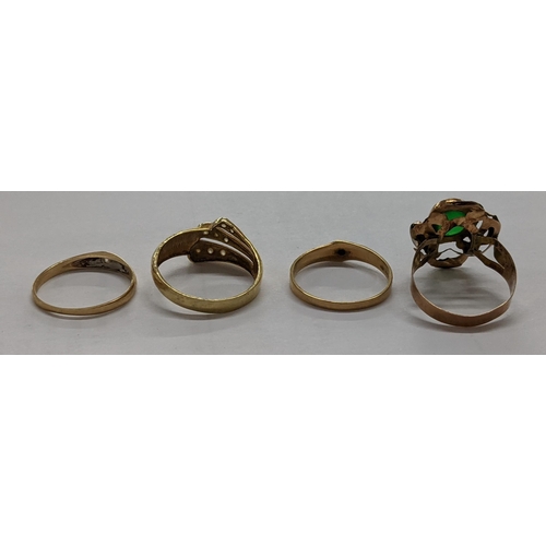 58 - A 14k gold ring set with three lines of white stones, gold rings each set with a single white stone ... 