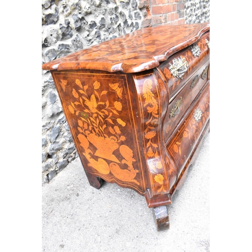 122 - A Dutch burr walnut and marquetry chest of drawers, 19th century, of serpentine form, the top inlaid... 