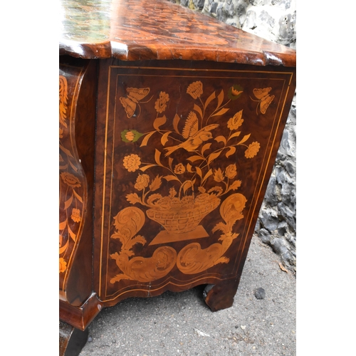 122 - A Dutch burr walnut and marquetry chest of drawers, 19th century, of serpentine form, the top inlaid... 