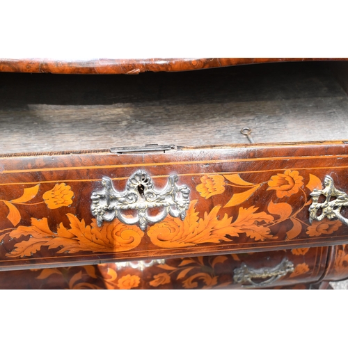 122 - A Dutch burr walnut and marquetry chest of drawers, 19th century, of serpentine form, the top inlaid... 