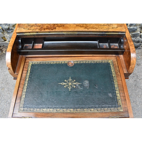 124 - A Victorian burr walnut piano Davenport, circa 1870, the pop-up top with fret-work letter compartmen... 