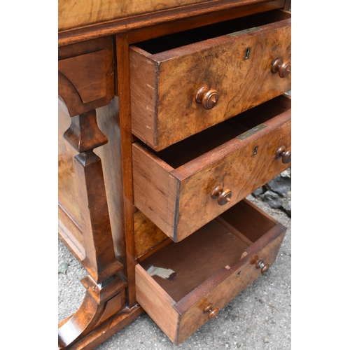 124 - A Victorian burr walnut piano Davenport, circa 1870, the pop-up top with fret-work letter compartmen... 