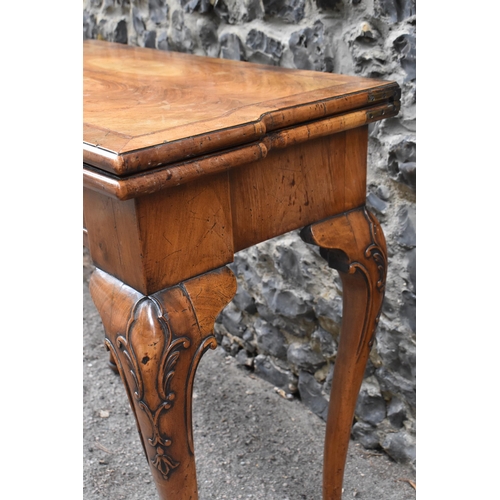 126 - A George II style figured walnut card table, 19th century, the bookmatched veneer top with herringbo... 