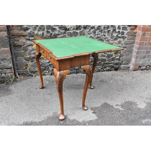 126 - A George II style figured walnut card table, 19th century, the bookmatched veneer top with herringbo... 