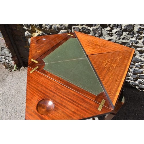 129 - An Edwardian satinwood envelope card table by Maple & Co, the square top with each flap string inlai... 