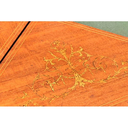 129 - An Edwardian satinwood envelope card table by Maple & Co, the square top with each flap string inlai... 