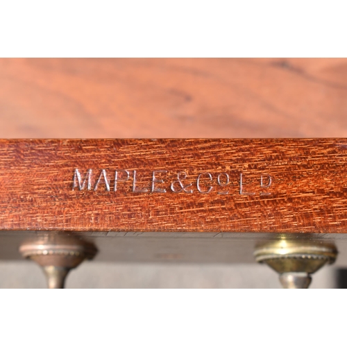 129 - An Edwardian satinwood envelope card table by Maple & Co, the square top with each flap string inlai... 