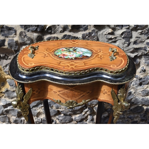 130 - A French Napoleon III ormolu and porcelain mounted marquetry jardiniere on stand, kidney-shaped with... 