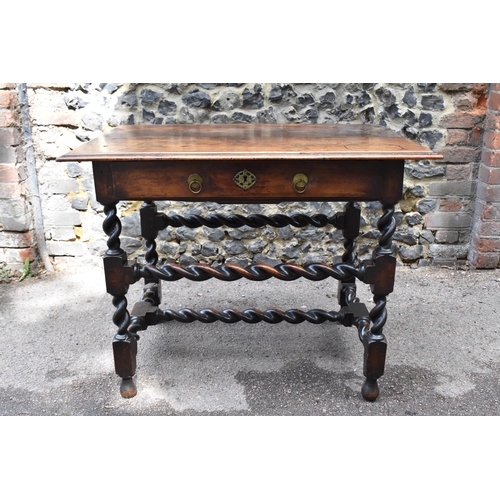 133 - A late 17th century walnut side table, circa 1690, with rectangular top above a frieze drawer mounte... 