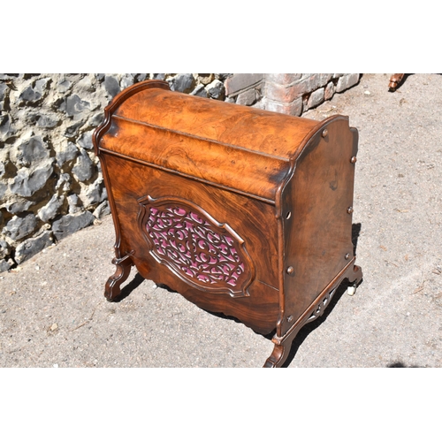 134 - A Victorian burr walnut and rosewood lidded music canterbury, with domed lid enclosing two compartme... 