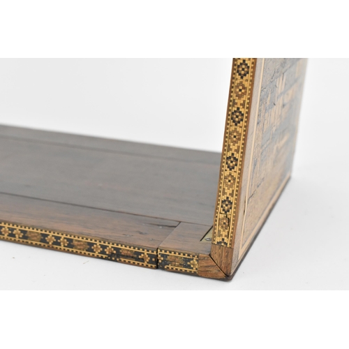 141 - A mid Victorian Tunbridge ware rosewood book slide, with hinged curved top ends decorated with mosai... 