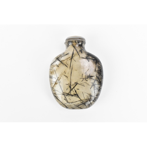 26 - A Chinese black hair rock crystal scent bottle, late 18th/early 19th century, of compressed rounded ... 