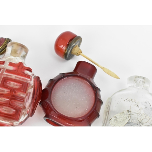 27 - A collection of Chinese glass and agate scent bottles, late 19th/20th century, to include two carved... 