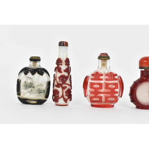 27 - A collection of Chinese glass and agate scent bottles, late 19th/20th century, to include two carved... 