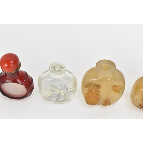 27 - A collection of Chinese glass and agate scent bottles, late 19th/20th century, to include two carved... 