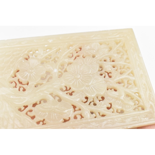 28 - A Chinese carved openwork white hardstone plaque, late 19th century, probably alabaster, of rectangu... 