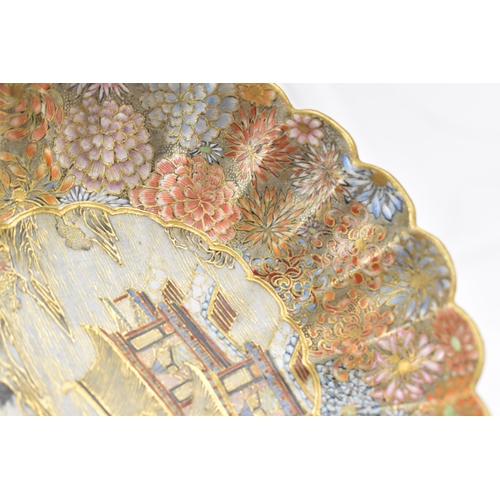 41 - A Japanese Satsuma porcelain decorative saucer by Yozan, Meiji period, with petal rim, decorated wit... 