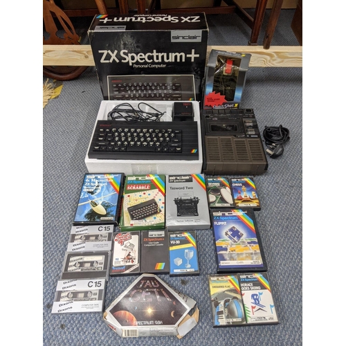 A sinclair Zx spectrum + personal computer together with Sinclair 