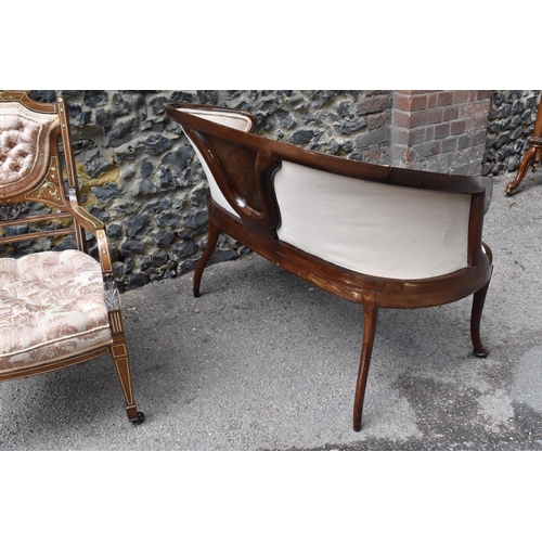 137 - An Edwardian rosewood, mahogany and bone inlaid salon suite, comprising a two seater sofa, an armcha... 