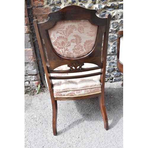 137 - An Edwardian rosewood, mahogany and bone inlaid salon suite, comprising a two seater sofa, an armcha... 