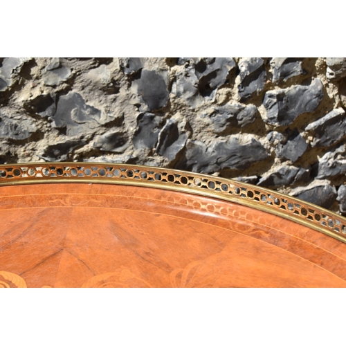 139 - A French Empire style ormolu-mounted round coffee table, 20th century, in the Egyptian revival taste... 