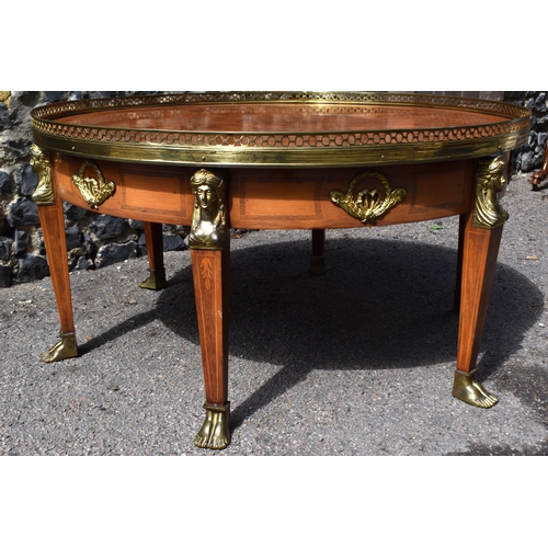 139 - A French Empire style ormolu-mounted round coffee table, 20th century, in the Egyptian revival taste... 