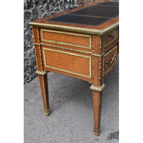 140 - A French ormolu-mounted kingwood parquetry desk, 20th century, inspired by the 19th century French c... 