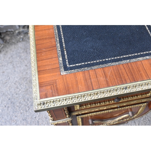 140 - A French ormolu-mounted kingwood parquetry desk, 20th century, inspired by the 19th century French c... 