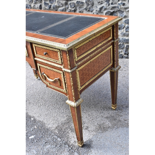 140 - A French ormolu-mounted kingwood parquetry desk, 20th century, inspired by the 19th century French c... 