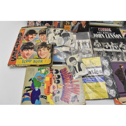 191 - A collection of 'The Beatles' ephemera, to include a 1960's oversized novelty comb by Lido Toys, a W... 