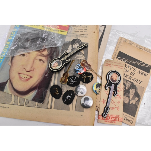 191 - A collection of 'The Beatles' ephemera, to include a 1960's oversized novelty comb by Lido Toys, a W... 