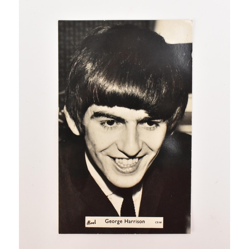 192 - A photograph postcard of George Harrison, with pencil signature to the reverse, believed to be by Ge... 