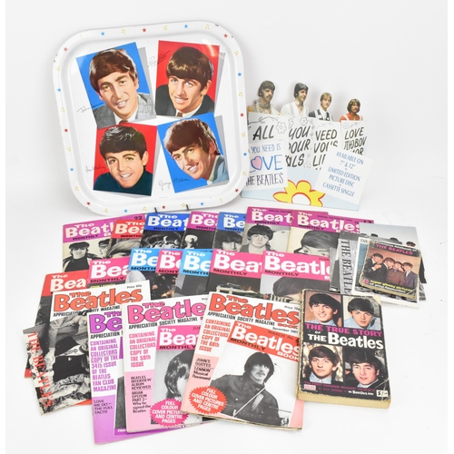 193 - A collection of 'The Beatles' ephemera, to include a Worcester Ware metal tray, The Beatles Monthly ... 