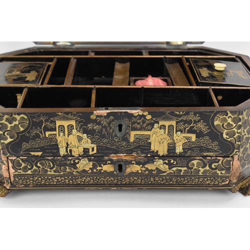 55 - A Chinese black lacquer workbox / sewing box, 19th century, of octagonal form, the lid with central ... 