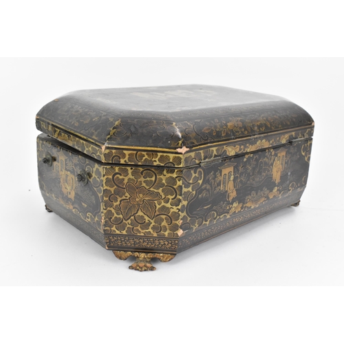 55 - A Chinese black lacquer workbox / sewing box, 19th century, of octagonal form, the lid with central ... 