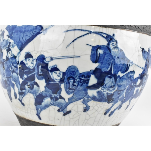 6 - A large Chinese blue and white porcelain fish bowl, 19th century, late Qing dynasty, with crackled g... 