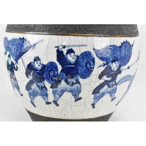 6 - A large Chinese blue and white porcelain fish bowl, 19th century, late Qing dynasty, with crackled g... 