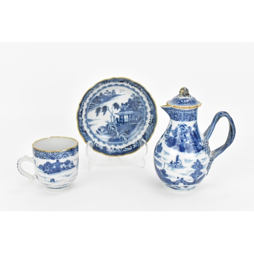 77 - A Chinese blue and white Nanking porcelain trio of teapot, cup and saucer, 18th century, the small t... 