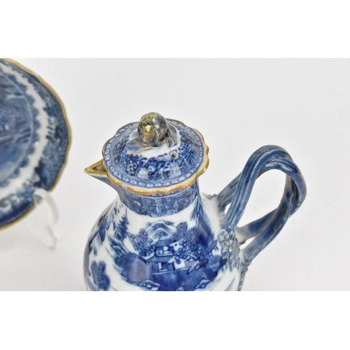 77 - A Chinese blue and white Nanking porcelain trio of teapot, cup and saucer, 18th century, the small t... 