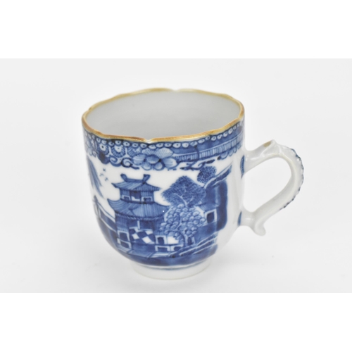 77 - A Chinese blue and white Nanking porcelain trio of teapot, cup and saucer, 18th century, the small t... 