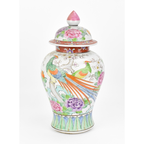 78 - A Chinese enamelled porcelain lidded vase, 20th century, of baluster form, the body decorated with p... 