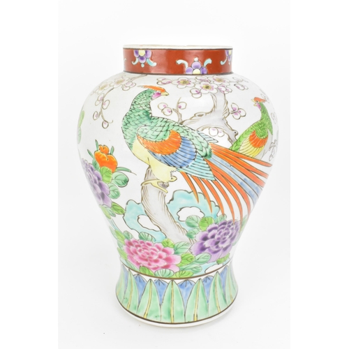 78 - A Chinese enamelled porcelain lidded vase, 20th century, of baluster form, the body decorated with p... 